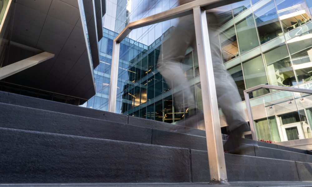 SpaceCo, close up of stairs with blurred person walking up, google headquarters